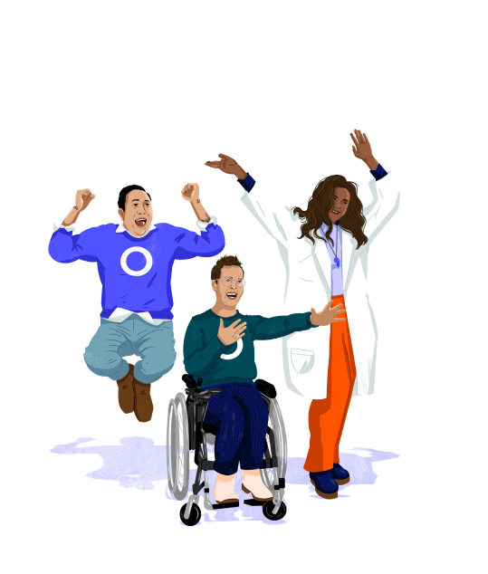 Care Guides cheering next to member in wheelchair